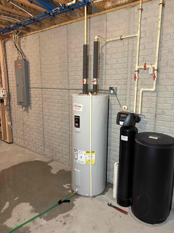 Performed annual maintenance on Carrier furnace per CCC Quality Plan agreement. Conducted comprehensive tune-up with filter replacement and gas pressure adjustment. System functioning properly after service. Also inspected leaking water heater and performed cleaning and maintenance on existing humidifier.