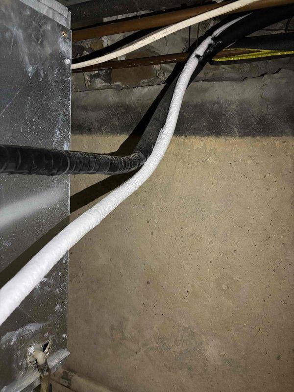 Responded to noise complaint from furnace. Discovered frozen evaporator coil causing pinging sound. Disconnected air conditioning unit to allow for proper inspection of system during summer months.