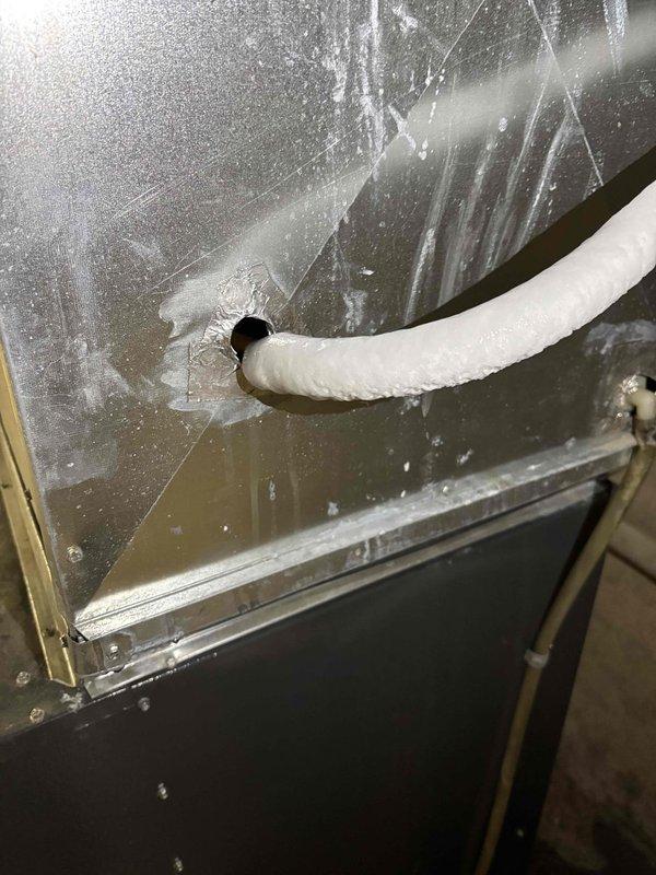 Responded to noise complaint from furnace. Discovered frozen evaporator coil causing pinging sound. Disconnected air conditioning unit to allow for proper inspection of system during summer months.