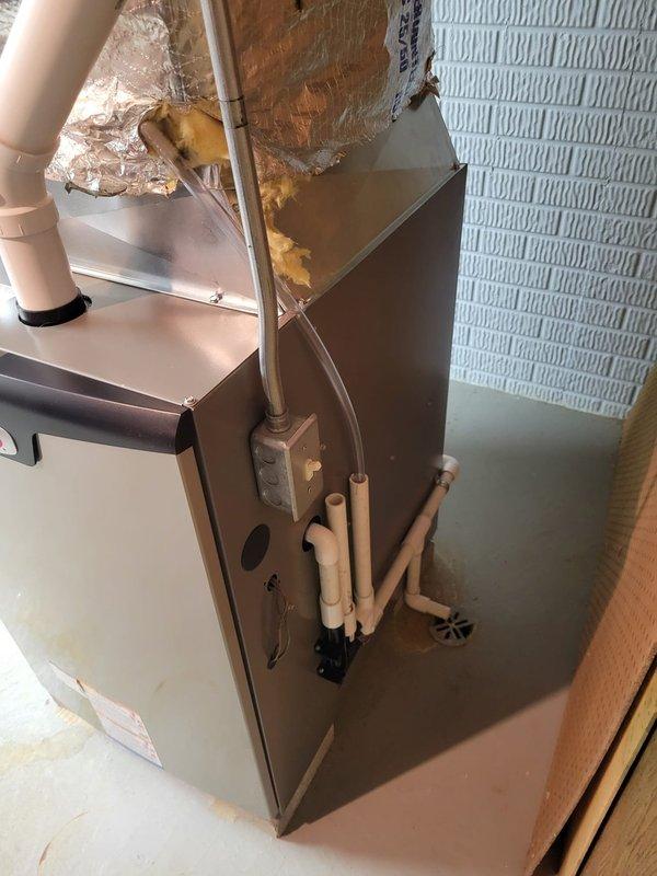 Successfully completed installation of Lennox EL297V 90K BTU furnace with 2" solid core PVC venting and 4" media cabinet, requiring return offset due to space constraints. Installed new zone board while reusing existing zone dampers and humidifier, and mounted two additional Ecobee smart thermostats at customer's request.