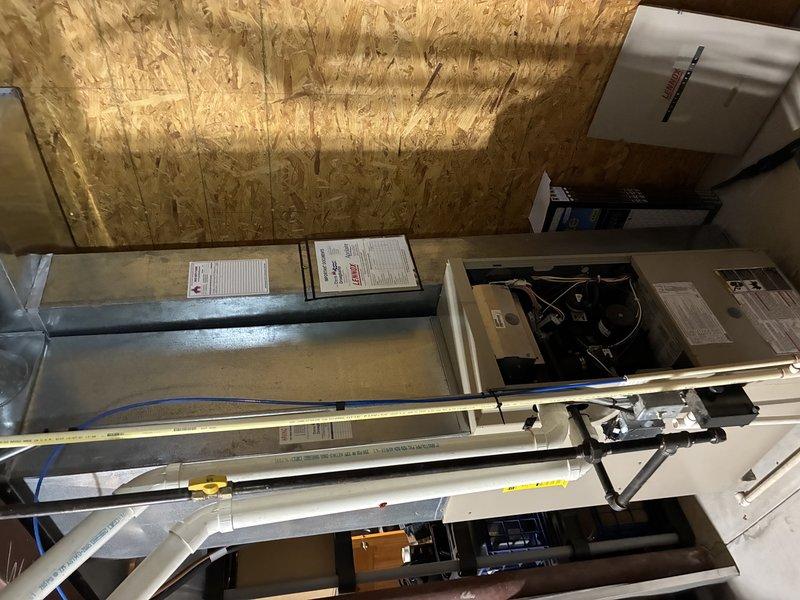 Responded to no heat complaint on 20-year-old furnace that had shut down overnight. Customer had reset system temporarily but requested service inspection. Diagnosed heavily soiled system requiring thorough cleaning. Serviced Fasco motor components and cleaned furnace to restore proper operation. System now functioning correctly with improved airflow.