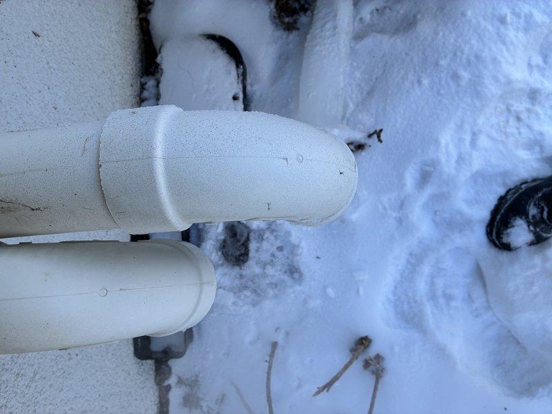 Responded to no-heat complaint on recently installed system. Diagnostic inspection revealed improper installation of exhaust and flue piping, causing combustion gases to be drawn back into the furnace. Documented evidence of excessive snow accumulation around exterior venting. Will return to complete necessary venting modifications to ensure proper system operation and safety.