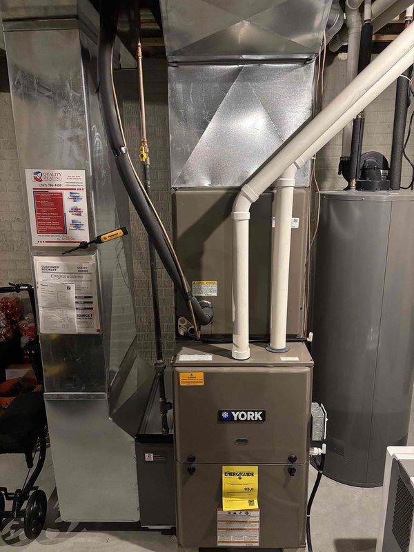 Responded to after-hours no heat call for a 5-year old York furnace where thermostat indicated operation but no heat was being delivered. Diagnostic inspection revealed severely clogged air filter due to humidifier issues causing system restriction. Replaced filter and performed system testing to verify proper operation, restoring heat to residence.