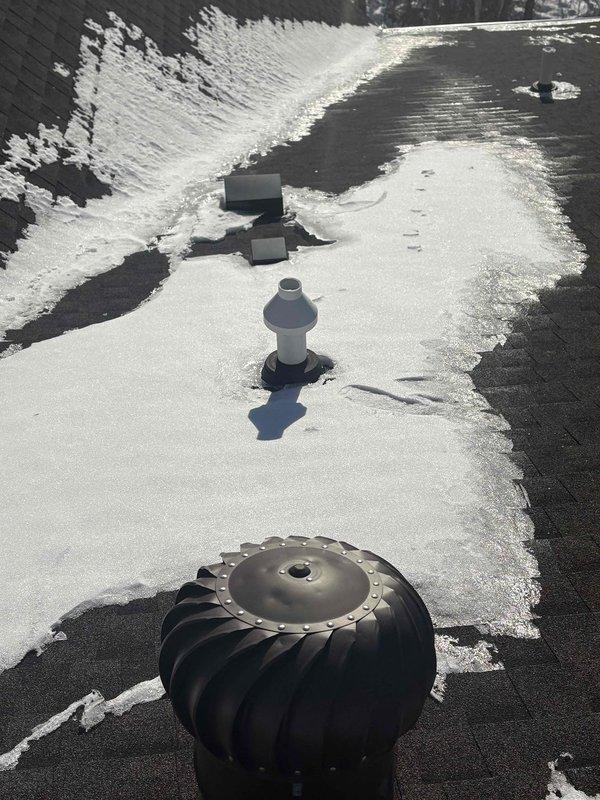 Responded to no heat call for aging system (10+ years). Diagnosed frozen flue vent on roof as the source of malfunction. Successfully thawed accumulated ice from ventilation components, restoring proper exhaust flow and returning heating system to normal operation.