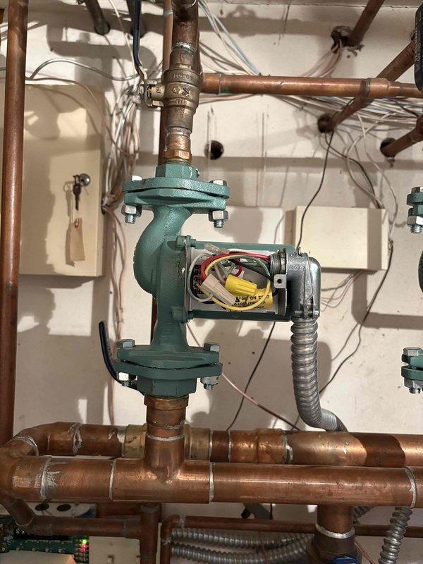 Diagnosed no heat issue on west side of home; discovered failed circulator pump on the hydronic heating system. Replaced defective pump, purged air from system, and verified proper operation of the boiler and circulation to all zones. System now functioning correctly with heat reaching all areas of the residence.