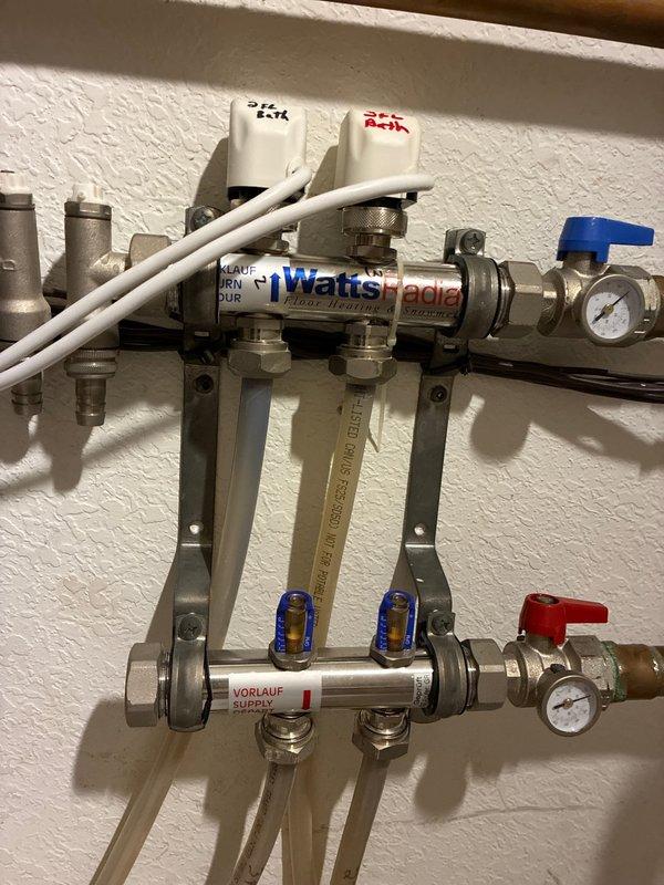 Responded to no heat call on 3rd floor bathroom. Diagnosed failed actuator in the radiant heating system. Installed replacement actuator on the Watts Radiant manifold and verified proper operation of the heating system. Control panel wiring and connections were inspected during service.