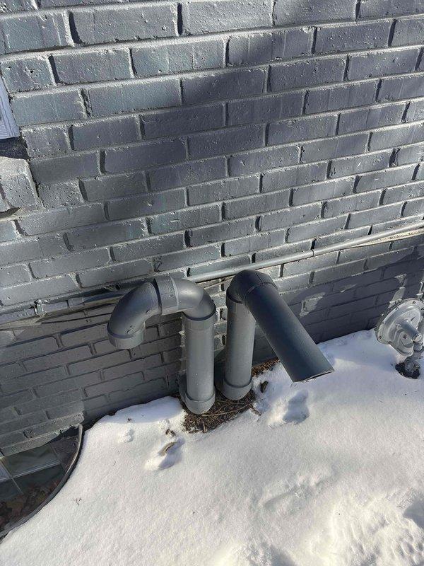 Responded to no-heat service call at vacant property with Heil furnace system over 10 years old. Accessed home via garage code, diagnosed failed ignition sequence and replaced faulty flame sensor. Also identified and repaired leaking AprilAire humidifier that had been previously shut off by cleaning staff. System now operating normally with proper heat output; verified functionality through the Ecobee thermostat.