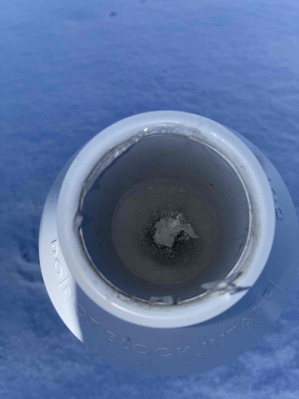 Responded to no heat complaint for chicken coop heating system. Inspected PVC exhaust/intake piping and discovered significant mineral buildup and residue in pipe connections. Cleaned affected components and restored proper airflow, resolving the heating issue.