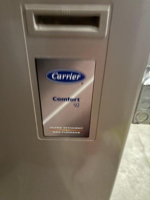 Responded to no-heat call for a Carrier Comfort 92 Ultra Efficient gas furnace (10+ years old). Diagnosed issue as restricted airflow due to clogged filter. Restored proper system operation by replacing the dirty filter.