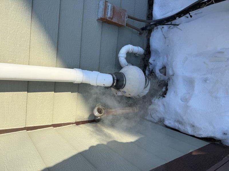 Completed installation of Lennox EL297V 70K furnace with media cabinet replacement. Utilized existing 10x25 return drop and installed 18ft of solid core 2" PVC venting. Confirmed gas line and floor drain were satisfactory, and connected to 15 amp circuit in Crouse Hinds Electrical Panel. Patched hole after removing return grille from return drop.