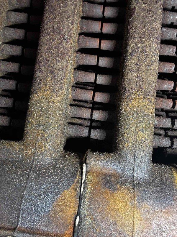 Diagnosed and repaired boiler with insufficient heating capacity that was unable to exceed 110° water temperature. Determined failure was due to faulty inducer assembly. Custom-rebuilt inducer motor housing to replace broken pressure tube ports as factory parts were unavailable for this model, restoring proper system operation.