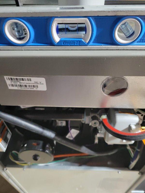 Completed installation of Lennox EL196E 70K BTU furnace with new media filter cabinet. Corrected improper PVC exhaust venting that was previously pitched backward and repositioned intake/exhaust configuration for proper operation. Replaced undersized return drop (24"x6") and added support bricks to furnace base. Verified gas connection and condensate drain functionality.