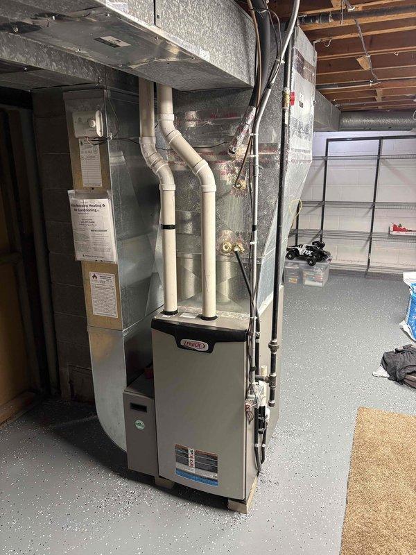 Responded to no heat call for tenant Josh. Upon inspection of the 10+ year old Lennox furnace, diagnosed faulty ignition system preventing proper heating cycle. Replaced ignition assembly and verified proper flame sequence. System now operating correctly with normal heat output. Photos taken of internal components and complete installation for documentation.