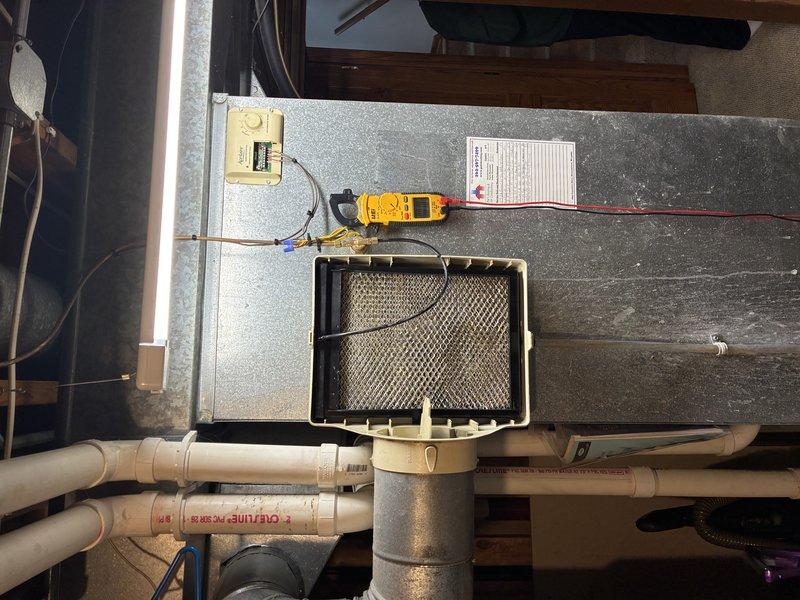 Responded to maintenance call back regarding intermittent Aprilaire humidifier operation following furnace service. Diagnostic testing revealed faulty control unit as evidenced by inconsistent electrical readings. While control replacement would resolve immediate issue, recommended full humidifier replacement due to age-related deterioration of the existing unit.