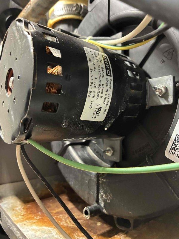 Responded to no heat service call with client complaint of burning smell from furnace. Upon inspection, found significant wear on blower motor with visible copper windings and signs of overheating. Discovered damaged control board with multiple relay failures causing system malfunction. Replaced both blower motor assembly and control board, restoring proper system function and eliminating burning odor.