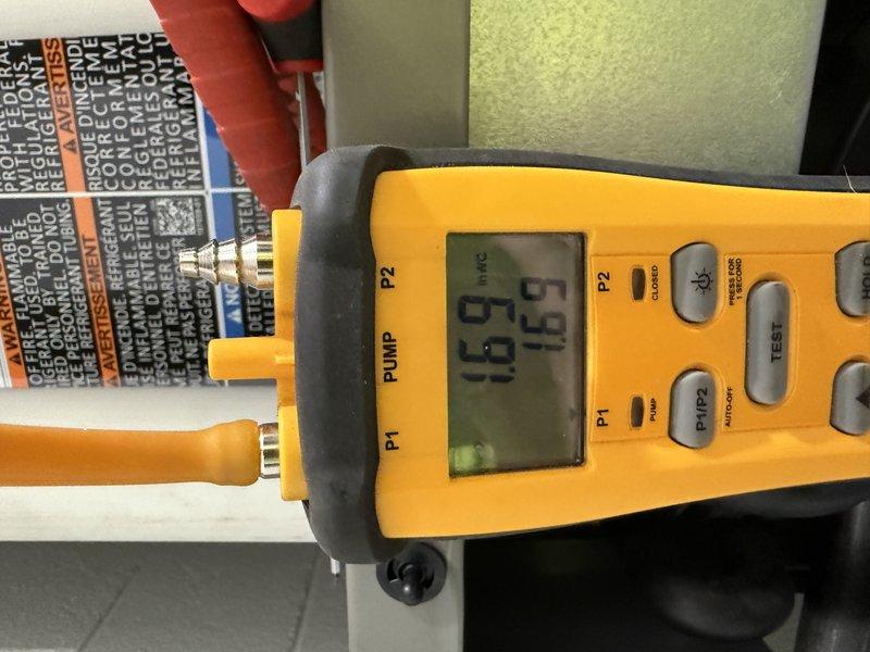 Successfully installed a Lennox EL297V 70K furnace with 30/36B cased coil in a two-zone 1780 sq ft residence. Corrected improper PVC venting by removing a reducer on the horizontal run that was causing water trapping and leakage. Reused existing return drop, media cabinet, zone dampers, and second floor thermostat while ensuring proper gas and drain connections.