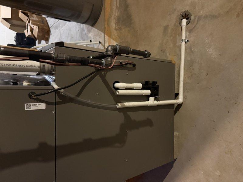 Completed installation of a complete HVAC system including an SLP99 90K BTU furnace, EL15KC1 3-ton condensing unit, and 30/36C frame coil. System upgrades included installing an S40 smart thermostat, 2" solid core PVC venting, media cabinet, new 30ft line set, and replacement of the return drop (22ft). Connected to existing gas and drain lines with new dedicated electrical service via Square D QO panel with appropriate breakers.