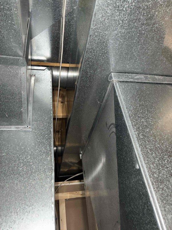 Responded to no heat service call. Upon inspection, determined furnace ignition failure was due to a faulty flame sensor. Cleaned sensor contacts and tested system operation through multiple heating cycles. Verified proper airflow through ductwork and confirmed system is now operating within normal parameters. All safety controls functioning correctly.