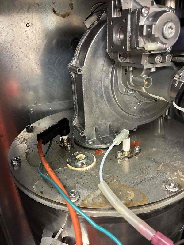 Arrived at customer's residence for service call via service door access (customer not home). Performed replacement of flame sensor and hot surface ignitor in furnace to restore proper ignition sequence and flame detection. Visual inspection of blower assembly and control board confirmed all connections secure and system operational after repair.