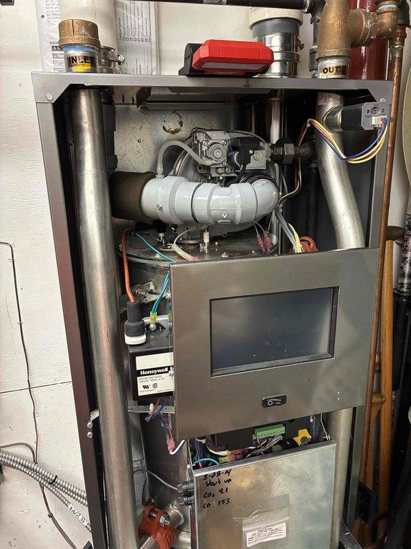 Arrived at customer's residence for service call via service door access (customer not home). Performed replacement of flame sensor and hot surface ignitor in furnace to restore proper ignition sequence and flame detection. Visual inspection of blower assembly and control board confirmed all connections secure and system operational after repair.