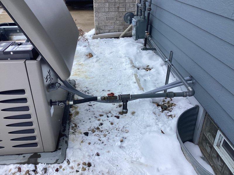 Performed warranty replacement of Kohler standby generator due to engine failure. Removed failed unit and installed new warranty replacement generator in same location adjacent to residence. Verified proper connections to existing gas line system and completed installation per manufacturer specifications.