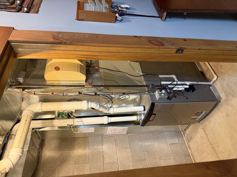 Successfully installed a Lennox SLP99 110K BTU furnace with S40 thermostat, ensuring proper leveling of all components as verified with spirit level. Connected PVC ventilation system and completed all necessary electrical wiring for the unit. Zoning system installation scheduled for future date.