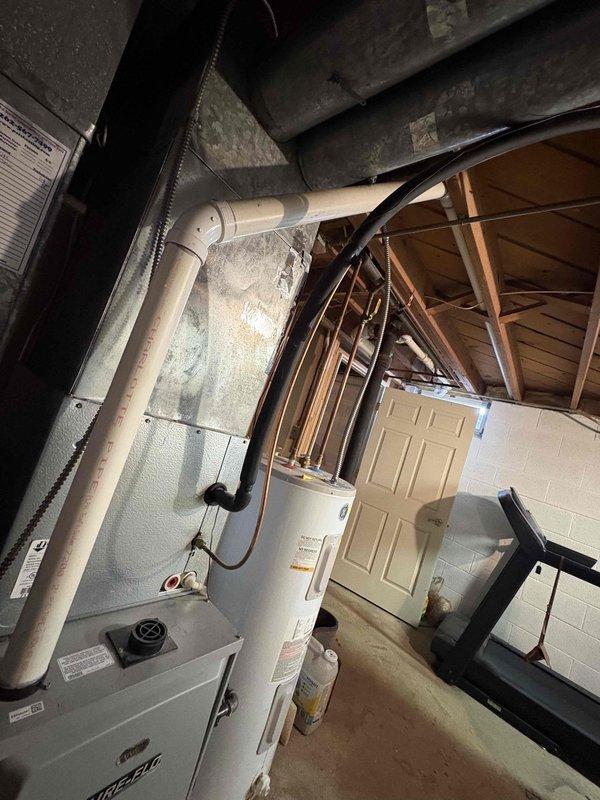 Responded to service callback for short cycling unit in basement utility area. Customer reported hearing clicking sound without system activation. Performed system reset which successfully restored normal operation. No further diagnostics required as reset resolved the immediate issue.