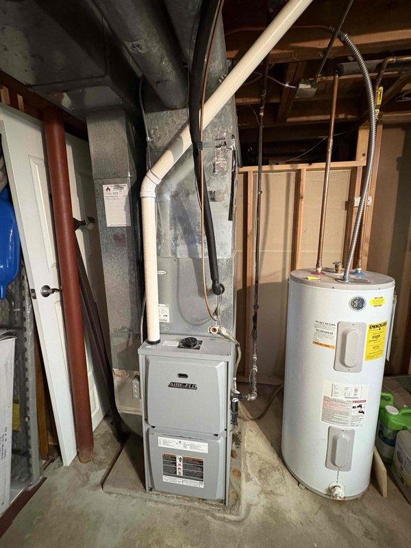 Responded to service callback for short cycling unit in basement utility area. Customer reported hearing clicking sound without system activation. Performed system reset which successfully restored normal operation. No further diagnostics required as reset resolved the immediate issue.