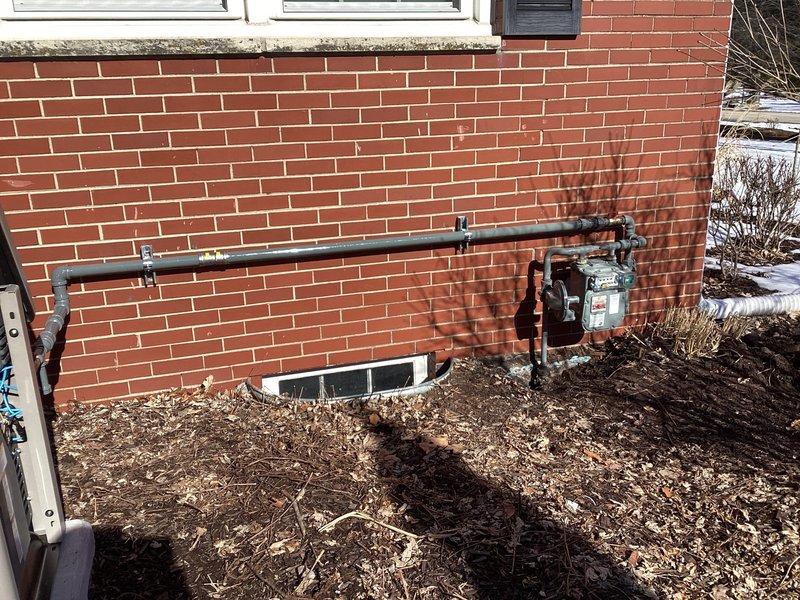 Successfully installed a 20KW Kohler Air-cooled Home Standby Generator with aluminum cabinet alongside a 200A Service rated Automatic transfer switch adjacent to the electrical panel. System includes battery, carb heater, oil heater, proper grounding/bonding, and was set on compacted gravel with concrete base with all necessary low/line voltage wiring and gas connections completed per specifications.