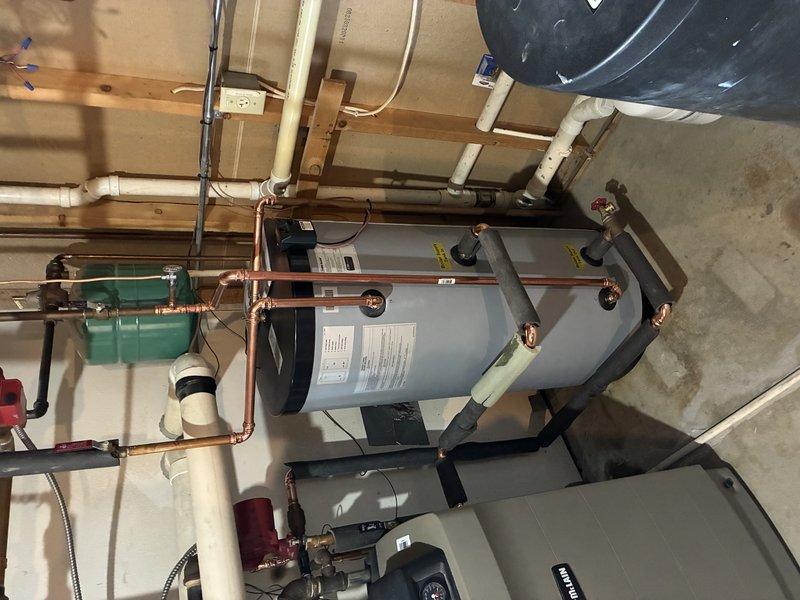 Successfully replaced warranty-covered leaking indirect water heater with new unit and installed an Aprilaire 700 humidifier on the recently installed air handler. Completed all necessary plumbing connections and verified proper operation of both the water heater and humidifier systems.