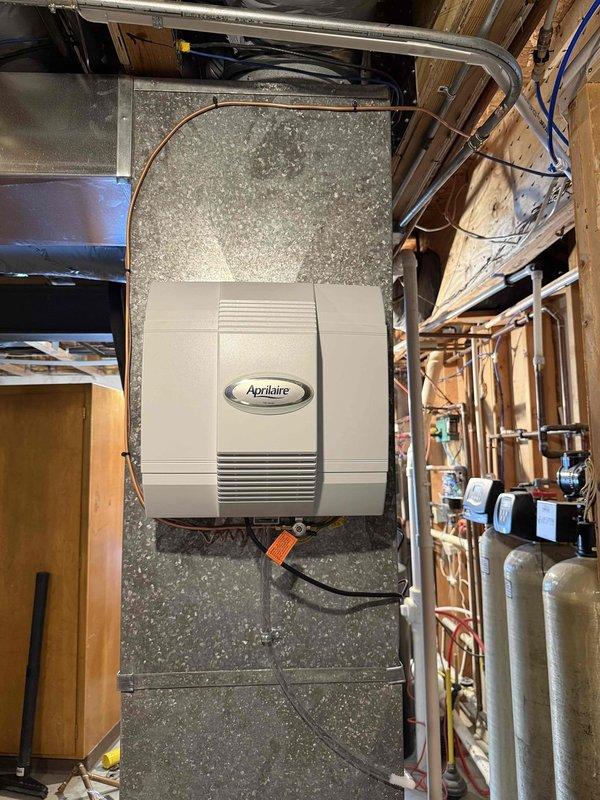 Successfully replaced warranty-covered leaking indirect water heater with new unit and installed an Aprilaire 700 humidifier on the recently installed air handler. Completed all necessary plumbing connections and verified proper operation of both the water heater and humidifier systems.