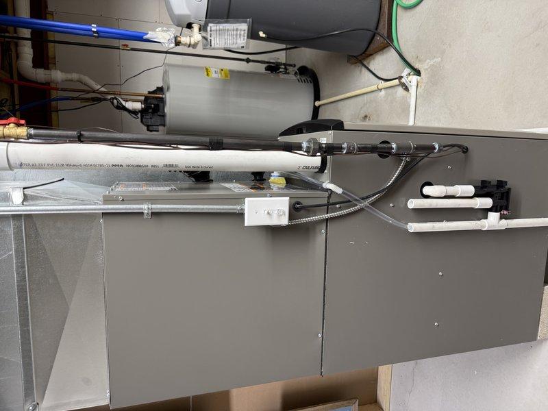 Completed installation of a complete HVAC system, including an EL297V 70K furnace, EL16KC1 2.5 ton air conditioning unit, and 30B-71 cased coil. Verified proper leveling and alignment of all components during installation, with photographic documentation confirming professional mounting with appropriate connections and hardware.