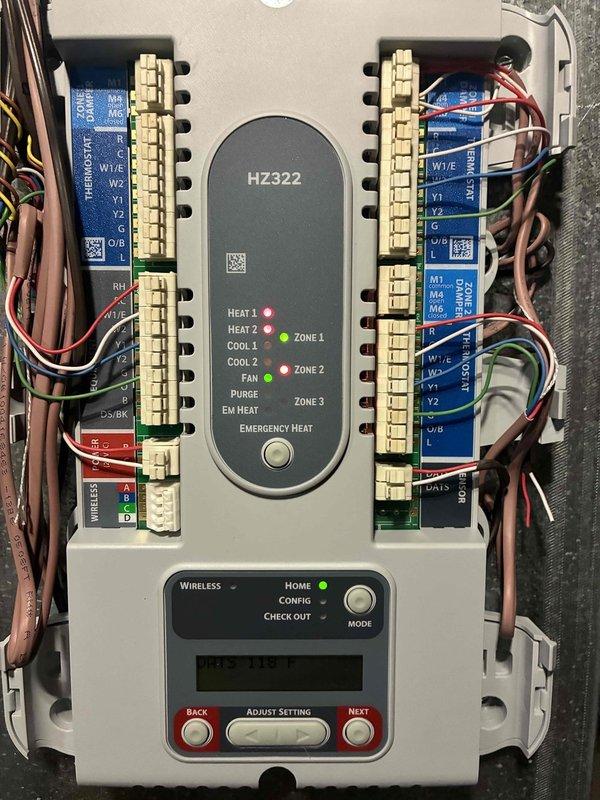 Replaced failing Honeywell zone panel with new HZ322 model, including installation of new transformer on the return air drop. Additionally, replaced M60 control on April Aire system, completing full zoning system upgrade. All connections properly terminated with organized wiring to ensure optimal zone control functionality.