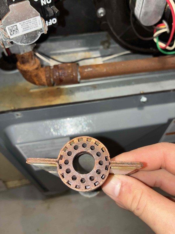 Completed annual maintenance on boiler and three furnaces under Quality Plan Agreement. Inspected aging copper components showing oxidation and rust on HVAC equipment. Examined PVC drainage system which showed proper installation with visible primer marks at joints, though noted some water staining in the surrounding area.