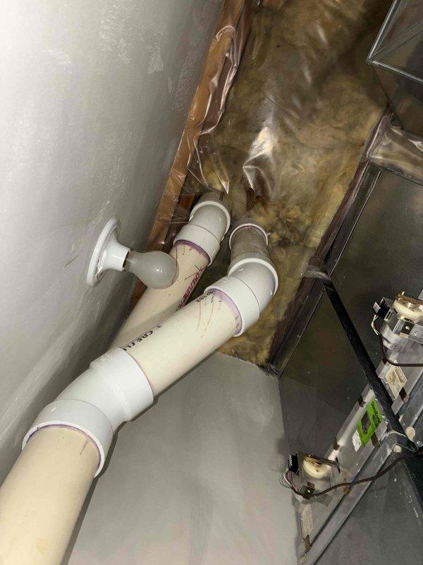 Completed annual maintenance on boiler and three furnaces under Quality Plan Agreement. Inspected aging copper components showing oxidation and rust on HVAC equipment. Examined PVC drainage system which showed proper installation with visible primer marks at joints, though noted some water staining in the surrounding area.