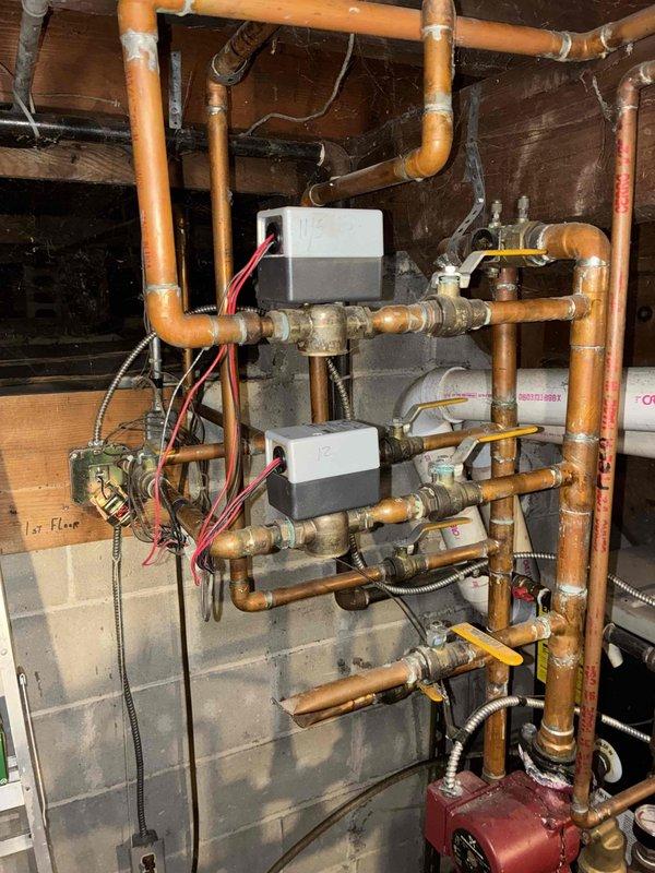 Replaced faulty zone valve on Munchkin boiler system per previous diagnosis. System was unable to shut off properly as reported by customer. New Caleffi zone valve successfully installed with proper connections to copper supply lines and control wiring, restoring normal heating cycle operation.