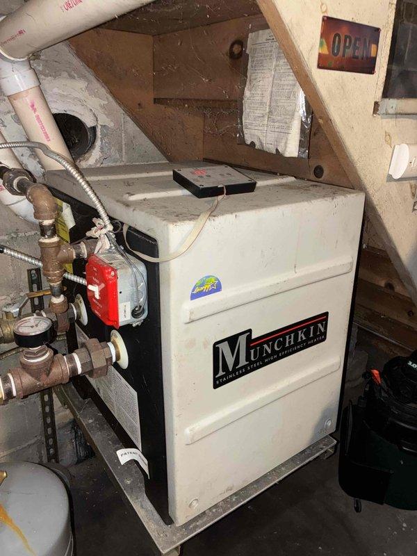 Replaced faulty zone valve on Munchkin boiler system per previous diagnosis. System was unable to shut off properly as reported by customer. New Caleffi zone valve successfully installed with proper connections to copper supply lines and control wiring, restoring normal heating cycle operation.