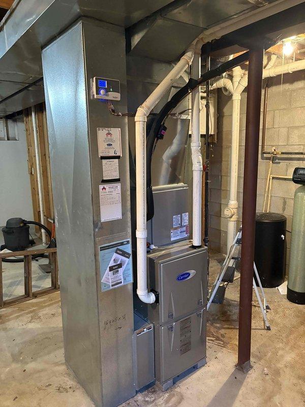 Performed annual furnace maintenance under CCC Quality Plan on Carrier unit. Completed standard tune-up procedures and identified weakened heat exchanger during inspection. Customer has been provided with equipment replacement options. System includes Aprilaire 600 humidifier which was also inspected during service.