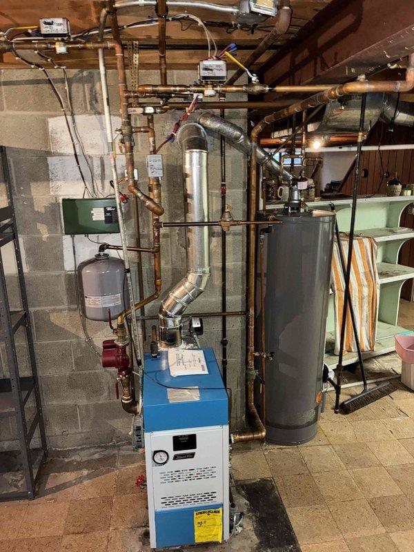 Performed annual maintenance on residential boiler system per prepaid maintenance plan. Inspected all components including copper piping, expansion tanks, valves, and connections throughout the heating system. System appears to be functioning normally with no issues identified during the service visit.