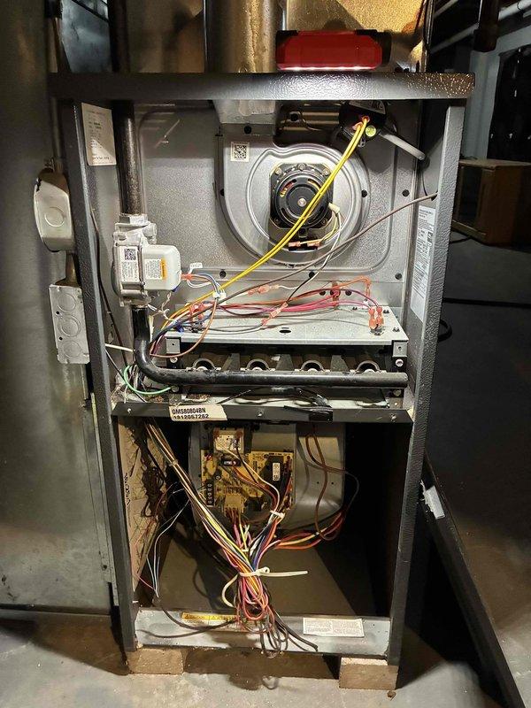 Responded to an after-hours no-heat emergency at tenant-occupied property. Inspection revealed furnace had been operating without filter since recent mold remediation approximately 2-3 months ago. Installed new 16x25x1 filter, cleaned accumulated debris from blower assembly and inspected aging circuit board showing discoloration. Restored proper heating function and documented condition with photos for property owner's records.