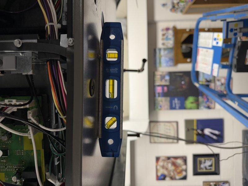 Completed installation of EL297E 90K BTU furnace, ensuring proper leveling of the unit and connection of control wiring to circuit board. Verified all electrical connections were secure and equipment was properly aligned according to manufacturer specifications. Photos were taken to document completed installation for service records.