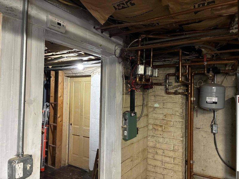 Completed annual maintenance service on TriangleTube boiler system per manufacturer specifications under prepaid maintenance plan. Inspected all components including expansion tank, copper piping connections, and control panel functionality. Visual inspection confirmed system is operating properly with no issues identified.