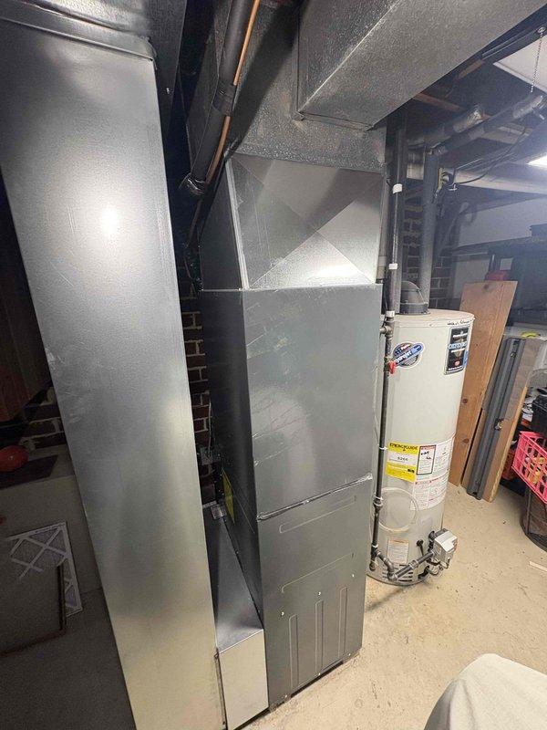 Performed scheduled prepaid furnace maintenance under CCC Quality Plan. Conducted comprehensive inspection and tune-up of basement HVAC system, finding equipment in good working condition. Replaced 16x25x4 air filter and documented installation with photos of the complete system including air handler unit and surrounding utility area.