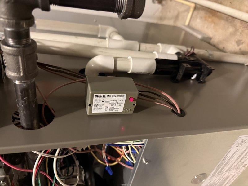 Completed warranty replacement of faulty RIB relay and zone thermostat for HVAC system with visible corrosion and moisture issues. Installed new components and verified proper operation of the system, including associated humidifier functionality.
