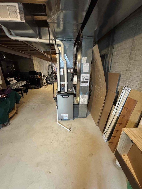 Completed full system installation including EL297V 70K furnace, EL15KC1 3-ton condenser, and 36B-71 coil. Replaced existing media cabinet with new Honeywell unit, reused 24ft of 2" solid core PVC, installed new 30ft refrigerant lines, and repositioned AC unit on new leveled pad with crushed stone support 10-12" from house.