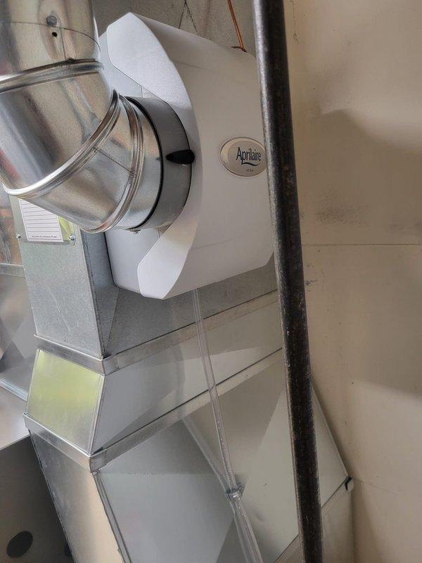 Successfully installed a high-efficiency HVAC system including a Lennox SLP99V 99% AFUE variable speed furnace, S40 Smart Wi-Fi thermostat, and Bradford White 50-gallon water heater. Completed necessary modifications including replacement of 18ft of 2" PVC, media cabinet replacement, return drop modifications, humidifier relocation, and fabrication of new transition between furnace and A-coil.