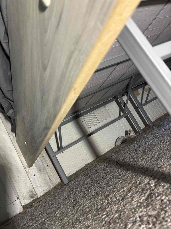 Performed annual maintenance agreement service on furnace system and April Aire humidifier, including filter and water panel replacement as requested by customer. Inspected ductwork and HVAC components in mechanical room, noting inadequate heating/cooling to room above garage due to thermostat placement issues. Discussed potential zoning options to resolve temperature distribution problems and collected payment on-site as required.