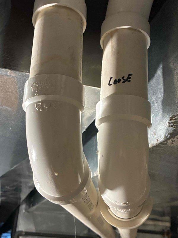 Responded to no-heat service call and discovered detached PVC vent pipe caused by collapsed ductwork from previous installation, which also damaged gas and water lines. Temporarily secured ductwork and reconnected vent pipe to restore safe operation; scheduled follow-up with additional personnel to properly rehang ductwork and repair damaged gas and water lines.