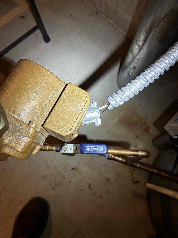 Responded to service call for fallen ductwork in basement utility area that had dropped approximately 6 inches, causing warping of water lines and gas piping. Technicians secured and lifted ductwork back to proper height, straightened 1" main gas piping with proper strapping, extended 1/2" gas piping to water heater, extended 1" copper pipes for hot and cold water connections to water heater, and repaired a loose PVC joint.