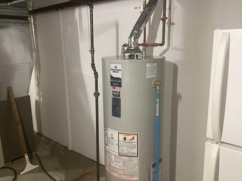Successfully replaced failed leaking water heater with new Bradford White 40-gallon atmospheric natural gas unit with proper venting and connections. Installation included removal of old unit, connection of copper supply/return lines, gas line hookup, and complete system testing to ensure proper operation.